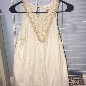 cream/shimmery tank